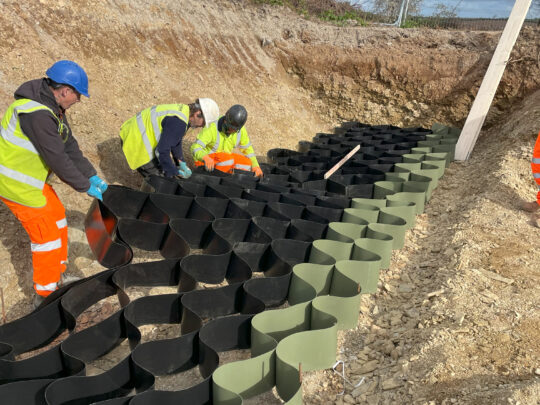 Setting out the first row of the Webwall by expanding the
panel into position