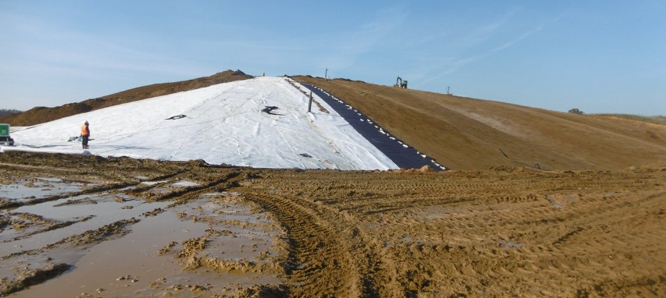 Geosynthetics capping design may need to take into account gas venting, a barrier, surface water drainage and cover material