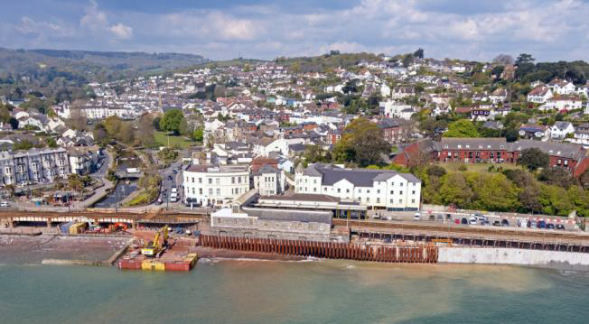 A section of the new, taller sea wall and promenade under construction in front of Dawlish rail station